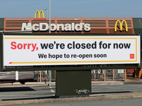 0_A-sign-outside-the-temporarily-closed-McDonalds-restaurant-in-Holyhead-during-the-coronavirus-crisi